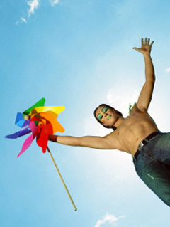 Photo:boy with rainbow flag