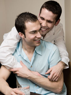 Photo: Two guys hugging