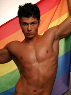 Photo:Boy with a Rainbow Flag