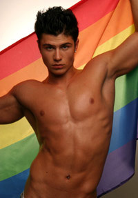 Photo:Boy with a rainbow flag